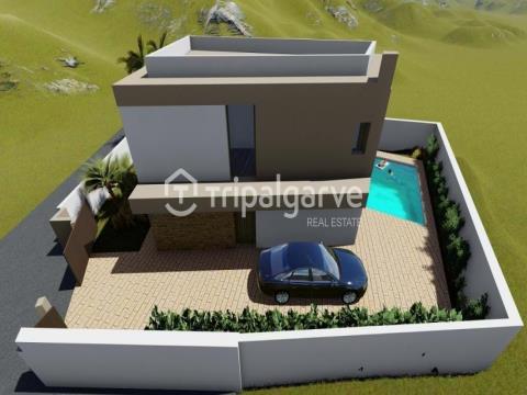 Urban land in Patã de Cima, with an approved project for a 3 bedroom villa and swimming pool.